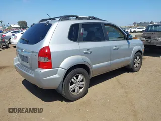 2007 Hyundai Tucson SE with VIN KM8JN12D07U632975, listed as a IAAI auction lot 42099734 with 154,320 mi miles. Bid and sale history available at carsss.com. Image 4.