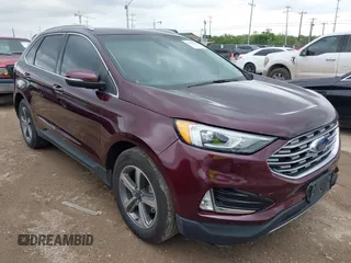 2020 Ford Edge SEL z VIN 2FMPK3J90LBA59717, wystawiony jako IAAI lot #42110510 z przebiegiem 71 244 mil mil oraz . Historia ofert i sprzedaży dostępna na DreamBid. Obrazek 1.