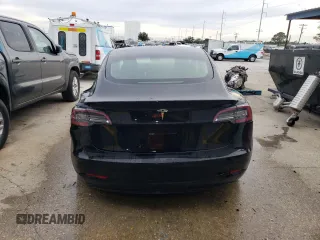 2022 Tesla Model 3 with VIN 5YJ3E1EA6NF188263, listed as a Copart auction lot 77542203 with 75,461 mi miles and Non Repairable. Bid and sale history available at DreamBid. Image 6.