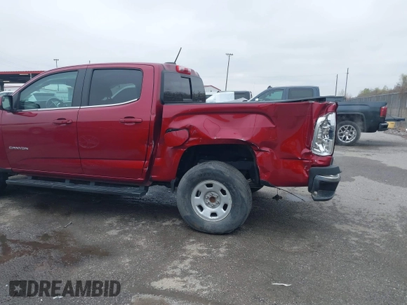 2018 GMC Canyon 2WD SLE with VIN 1GTG5CEN5J1285392, listed as a IAAI auction lot 41596516 with 73,885 mi miles. Bid and sale history available at carsss.com. Image 6.