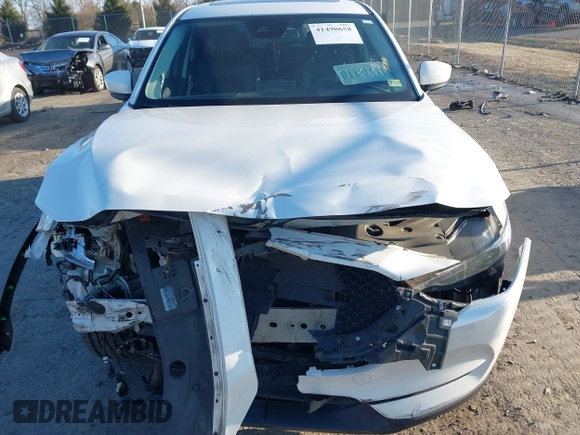 2018 Mazda CX-5 S Premium with VIN JM3KFBDM8J1419006, listed as a IAAI auction lot 41498658 with 123,622 mi miles and . Bid and sale history available at DreamBid. Image 13.