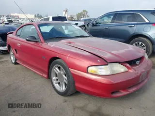 1996 Ford Mustang GT z VIN 1FALP42X2TF163881, wystawiony jako IAAI lot #42342549 z przebiegiem 92 660 mil mil oraz . Historia ofert i sprzedaży dostępna na DreamBid. Obrazek 1.