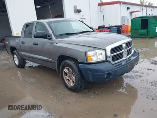 2007 Dodge Dakota SLT z VIN 1D7HW48K17S129383, wystawiony jako IAAI lot #42253930 z przebiegiem 164 430 mil mil oraz . Historia ofert i sprzedaży dostępna na DreamBid. Obrazek 1.