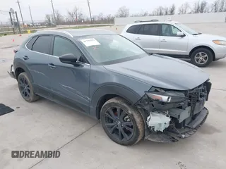 2023 Mazda CX-30 S Carbon Edition with VIN 3MVDMBCM0PM532449, listed as a IAAI auction lot 41799255 with 60,604 mi miles and . Bid and sale history available at DreamBid. Image 1.