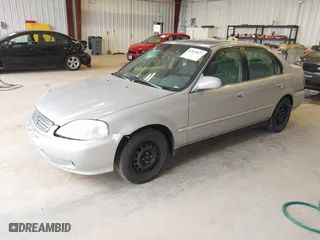 1999 Honda Civic EX with VIN 1HGEJ8640XL013417, listed as a IAAI auction lot 41915827 with 257,696 mi miles. Bid and sale history available at carsss.com. Image 2.