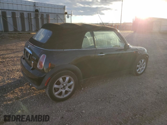 2007 MINI Convertible with VIN WMWRF33597TG16707, listed as a Copart auction lot 79104014 with 113,380 mi miles and Salvage Title. Bid and sale history available at DreamBid. Image 3.