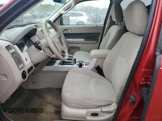 2009 Mercury Mariner with VIN 4M2CU91G69KJ15232, listed as a Copart auction lot 66601584 with 179,928 mi miles and Salvage title. Bid and sale history available at DreamBid. Image 7.