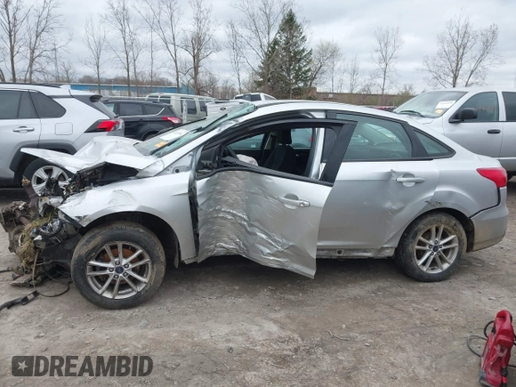 2015 Ford Focus SE with VIN 1FADP3F20FL262380, listed as a IAAI auction lot 42019840 with Not provided miles and . Bid and sale history available at DreamBid. Image 14.