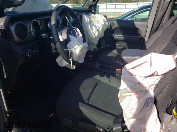 2020 Jeep Wrangler Willys with VIN 1C4GJXAG5LW307083, listed as a Copart auction lot 86994744 with 28,873 mi miles and Salvage title. Bid and sale history available at DreamBid. Image 7.