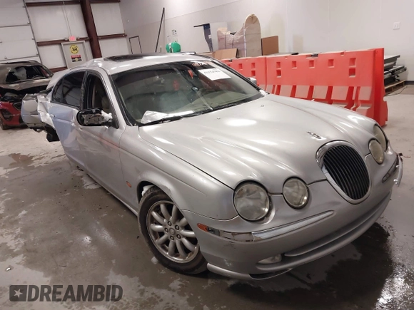 2001 Jaguar S-Type with VIN SAJDA01P81GM09061, listed as a IAAI auction lot 41554986 with 104,105 mi miles and . Bid and sale history available at DreamBid. Image 1.