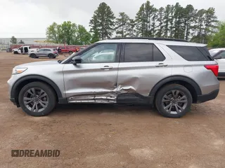 2022 Ford Explorer XLT z VIN 1FMSK7DH2NGB99767, wystawiony jako IAAI lot #41945162 z przebiegiem 59 383 mil mil oraz . Historia ofert i sprzedaży dostępna na DreamBid. Obrazek 6.