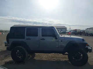 2016 Jeep Wrangler Unlimited Sport z VIN 1C4HJWDGXGL328531, wystawiony jako IAAI lot #42056907 z przebiegiem 75 871 mil mil oraz . Historia ofert i sprzedaży dostępna na DreamBid. Obrazek 13.