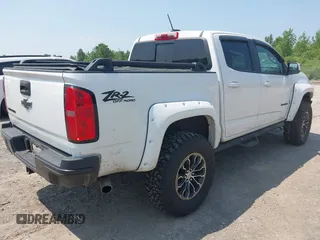 2019 Chevrolet Colorado 4WD ZR2 with VIN 1GCGTEEN9K1335858, listed as a IAAI auction lot 42447016 with 47,303 mi miles and . Bid and sale history available at DreamBid. Image 4.
