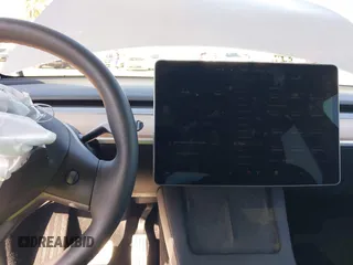 2023 Tesla Model Y Performance with VIN 7SAYGDEF5PF823122, listed as a IAAI auction lot 41546480 with 12,943 mi miles and . Bid and sale history available at DreamBid. Image 17.