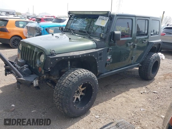2007 Jeep Wrangler Unlimited X with VIN 1J4GA39147L101084, listed as a IAAI auction lot 41988628 with 194,562 mi miles and . Bid and sale history available at DreamBid. Image 2.