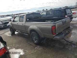 2004 Nissan Frontier XE with VIN 1N6ED29X24C455875, listed as a Copart auction lot 88430605 with 228,936 mi miles and Salvage title. Bid and sale history available at DreamBid. Image 2.