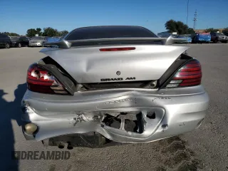 2004 Pontiac Grand Am SE1 with VIN 1G2NF52E34M567770, listed as a Copart auction lot 82089934 with 215,976 mi miles and Salvage Title. Bid and sale history available at carsss.com. Image 6.