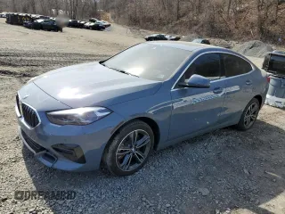 2023 BMW 2 Series 228i xDrive with VIN WBA73AK05P7M55059, listed as a Copart auction lot 49292115 with 14,704 mi miles and Salvage Title. Bid and sale history available at carsss.com. Image 1.