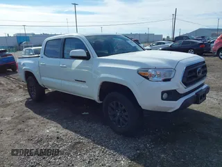 2023 Toyota Tacoma 4WD SR with VIN 3TMCZ5AN1PM638968, listed as a IAAI auction lot 41548051 with 21,841 mi miles. Bid and sale history available at carsss.com. Image 1.