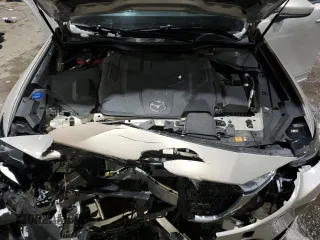 2024 Mazda CX-90 S z VIN JM3KK1HC6R1126403, wystawiony jako Copart lot #45532005 z przebiegiem 11 651 mil mil oraz Szkoda całkowita • Salvage title. Historia ofert i sprzedaży dostępna na DreamBid. Obrazek 14.