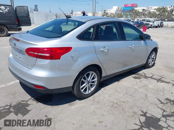 2017 Ford Focus SE с VIN 1FADP3F2XHL308915, выставлен на аукционе IAAI как лот 42673900 с пробегом 68 407 миль миль и . История ставок и продаж доступна на DreamBid. Изображение 4.