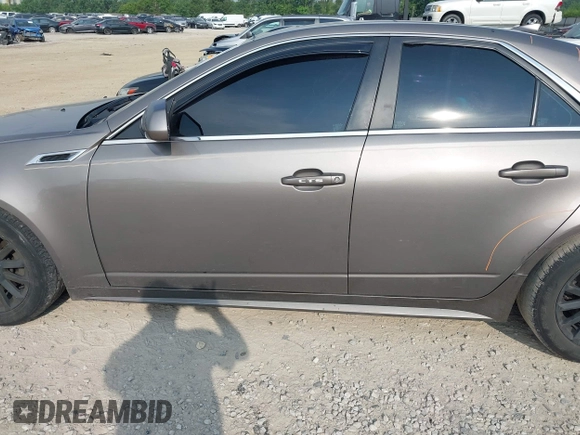 2012 Cadillac CTS Luxury with VIN 1G6DE5E5XC0137961, listed as a IAAI auction lot 42504953 with 179,263 mi miles and . Bid and sale history available at DreamBid. Image 14.