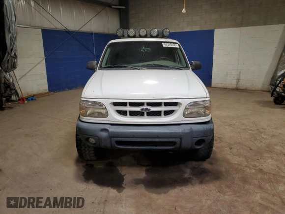 2000 Ford Explorer XLT с VIN 1FMZU83PXYZA51396, выставлен на аукционе Copart как лот 62365505 с пробегом 230 018 миль миль и Списание • Salvage title. История ставок и продаж доступна на DreamBid. Изображение 5.