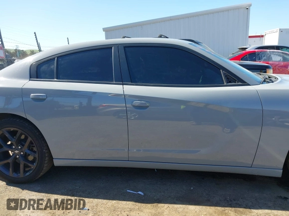 2022 Dodge Charger SXT with VIN 2C3CDXBG3NH231325, listed as a IAAI auction lot 41667810 with 74,967 mi miles and . Bid and sale history available at DreamBid. Image 14.