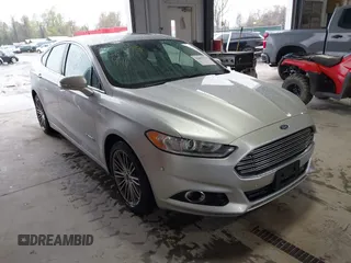 2013 Ford Fusion SE Hybrid with VIN 3FA6P0LU2DR319335, listed as a IAAI auction lot 42007573 with 135,099 mi miles. Bid and sale history available at carsss.com. Image 1.