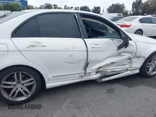 2014 Mercedes-Benz C-Class C 250 Sport with VIN WDDGF4HB9EA945465, listed as a IAAI auction lot 42035693 with 146,809 mi miles. Bid and sale history available at carsss.com. Image 17.