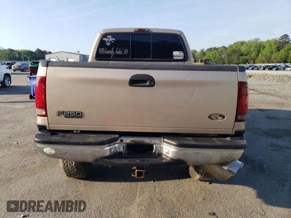 1999 Ford F-250 XL with VIN 1FTNX21F0XEE70963, listed as a Copart auction lot 52294955 with 218,969 mi miles and Salvage title. Bid and sale history available at DreamBid. Image 6.