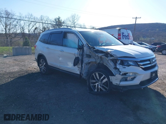 2016 Honda Pilot Touring with VIN 5FNYF6H98GB017079, listed as a IAAI auction lot 42055272 with 142,726 mi miles and . Bid and sale history available at DreamBid. Image 1.