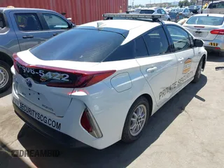 2020 Toyota Prius LE with VIN JTDKARFP6L3159932, listed as a IAAI auction lot 42714958 with 157,110 mi miles and . Bid and sale history available at DreamBid. Image 4.