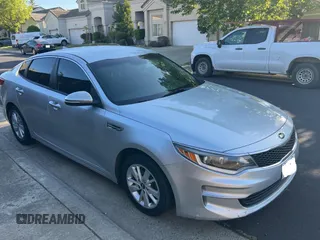 2016 Kia Optima LX with VIN 5XXGT4L38GG022940, listed as a Copart auction lot 54086785 with 145,038 mi miles and Clean Title. Bid and sale history available at carsss.com. Image 1.