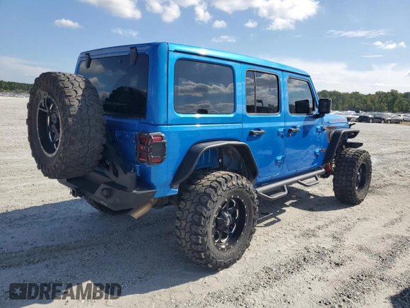 2023 Jeep Wrangler Rubicon with VIN 1C4HJXFN5PW504658, listed as a Copart auction lot 69063484 with 32,490 mi miles and Salvage title. Bid and sale history available at DreamBid. Image 3.