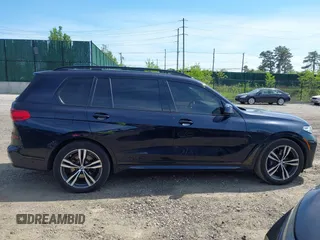 2019 BMW X7 xDrive40i z VIN 5UXCW2C5XKL084486, wystawiony jako IAAI lot #42230283 z przebiegiem 78 975 mil mil oraz . Historia ofert i sprzedaży dostępna na DreamBid. Obrazek 13.