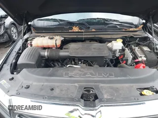 2021 Ram 1500 Big Horn z VIN 1C6RREFG1MN532758, wystawiony jako IAAI lot #41395774 z przebiegiem 66 750 mil mil oraz . Historia ofert i sprzedaży dostępna na DreamBid. Obrazek 10.