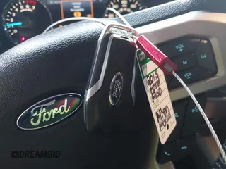 2015 Ford F-150 XL with VIN 1FTEW1CF1FKD55749, listed as a IAAI auction lot 41242324 with 164,415 mi miles. Bid and sale history available at carsss.com. Image 11.