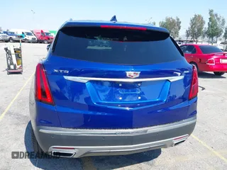 2023 Cadillac XT5 FWD Premium Luxury z VIN 1GYKNCRS3PZ176654, wystawiony jako IAAI lot #42136259 z przebiegiem 20 403 mil mil oraz . Historia ofert i sprzedaży dostępna na DreamBid. Obrazek 17.