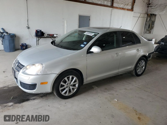 2010 Volkswagen Jetta SEL z VIN 3VWRX7AJ4AM100858, wystawiony jako Copart lot #60695995 z przebiegiem 158 477 mil mil oraz Szkoda całkowita • Salvage title. Historia ofert i sprzedaży dostępna na DreamBid. Obrazek 1.