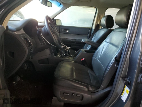 2015 Ford Flex SEL z VIN 2FMGK5C86FBA03477, wystawiony jako Copart lot #53562725 z przebiegiem 136 616 mil mil oraz Tytuł czysty. Historia ofert i sprzedaży dostępna na DreamBid. Obrazek 7.