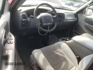 2003 Ford F-150 XL с VIN 1FTRX18LX3NA80535, выставлен на аукционе Copart как лот 61839854 с пробегом 291 397 миль миль и Списание • Salvage title. История ставок и продаж доступна на DreamBid. Изображение 8.
