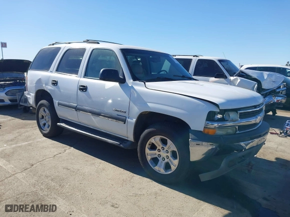 2001 Chevrolet Tahoe LT with VIN 1GNEC13T01J132932, listed as a IAAI auction lot 41398864 with 151,411 mi miles. Bid and sale history available at carsss.com. Image 1.
