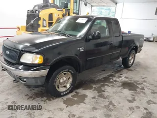 2000 Ford F-150 XL with VIN 1FTRX18W9YNB67215, listed as a IAAI auction lot 42558112 with 118,628 mi miles and . Bid and sale history available at DreamBid. Image 2.