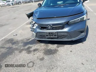 2023 Honda Civic EX with VIN 2HGFE1F74PH323979, listed as a IAAI auction lot 42499373 with 70,326 mi miles and . Bid and sale history available at DreamBid. Image 12.