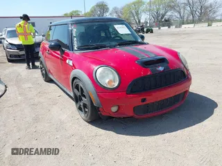 2010 MINI Hardtop S with VIN WMWMF7C51ATX43277, listed as a IAAI auction lot 42107871 with 102,886 mi miles and . Bid and sale history available at DreamBid. Image 1.