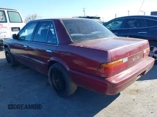 1991 Nissan Stanza GXE z VIN JN1FU21P3MT324864, wystawiony jako IAAI lot #41867603 z przebiegiem 173 678 mil mil oraz . Historia ofert i sprzedaży dostępna na DreamBid. Obrazek 3.