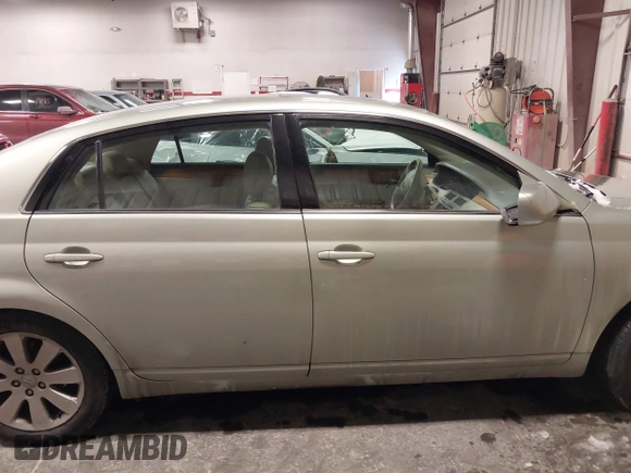 2006 Toyota Avalon XL with VIN 4T1BK36B16U062713, listed as a IAAI auction lot 41598608 with 142,598 mi miles. Bid and sale history available at carsss.com. Image 13.