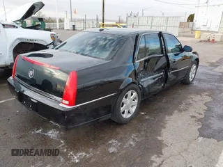 2006 Cadillac DTS w/1SC with VIN 1G6KD57Y96U251691, listed as a IAAI auction lot 41086147 with 128,959 mi miles. Bid and sale history available at carsss.com. Image 4.