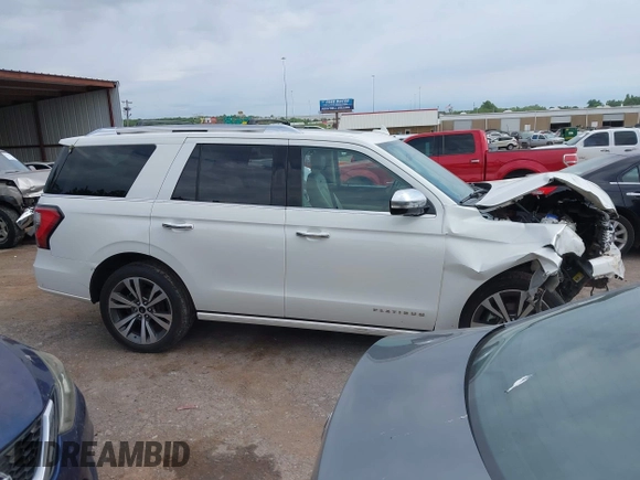 2020 Ford Expedition Platinum z VIN 1FMJU1MT0LEA73343, wystawiony jako IAAI lot #42303764 z przebiegiem 200 132 mil mil oraz . Historia ofert i sprzedaży dostępna na DreamBid. Obrazek 14.
